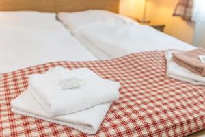 Posteľ alebo postele v izbe v ubytovaní Hotel Seifert