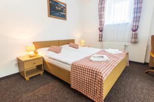 Posteľ alebo postele v izbe v ubytovaní Hotel Seifert