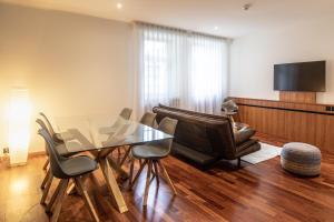 TV a/nebo společenská místnost v ubytování Apart Hotel Amadeo