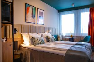 Postel nebo postele na pokoji v ubytování Quality Hotel Prinsen + 37 fotografií