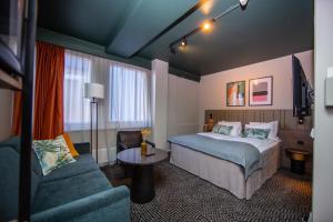 Postel nebo postele na pokoji v ubytování Quality Hotel Prinsen