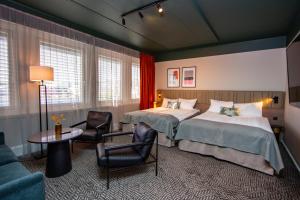 Postel nebo postele na pokoji v ubytování Quality Hotel Prinsen