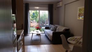 A seating area at Athenian apartment with garden, near metro station Chalandri Nu 3