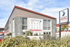 a office building with a calendar on the side of it at The Riverstone in Rangiora