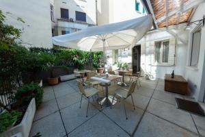 Patio alebo iná vonkajšia časť ubytovania B&B Madam Treviso