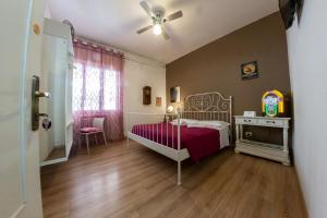 Posteľ alebo postele v izbe v ubytovaní B&B Madam Treviso