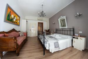 Posteľ alebo postele v izbe v ubytovaní B&B Madam Treviso