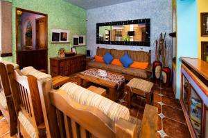 TV a/nebo společenská místnost v ubytování La Casona Tequisquiapan Hotel & Spa