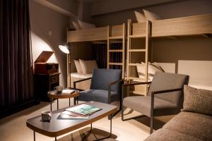 Posezení v ubytování HOTEL PETIT SUITE SOGENJI ISHIMON