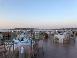 a table set up for a wedding with a view at Hotel Palau in Palau
