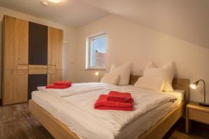 Cama o camas de una habitación en Ferienwohnung 3 am Biohof Eriskirch