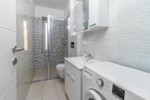 Kúpeľňa v ubytovaní Apartmani Dada + 22 fotografií
