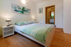 Postel nebo postele na pokoji v ubytování Apartments BARBARA 3
