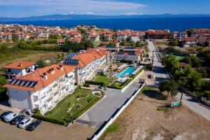 an aerial view of a house with a swimming pool at Lagaria Hotel in Afitos