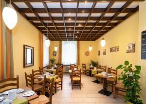 Restoranas ar kita vieta pavalgyti apgyvendinimo įstaigoje Hotel Restaurant Schwert