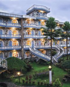 a large building with stairs in front of it at Hotel The Kantipur in Pokhara