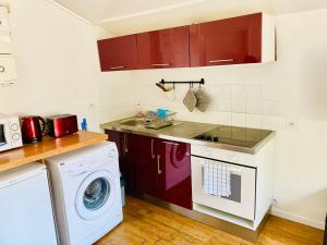 Кухня или мини-кухня в Appartement carnot
