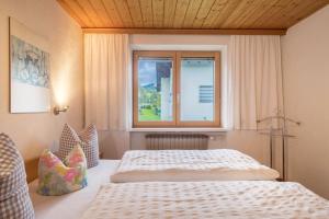 Postel nebo postele na pokoji v ubytování Försterhaus Wohnung Obergeschoss