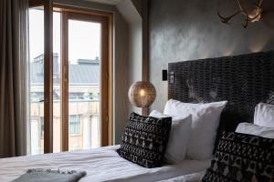 Postel nebo postele na pokoji v ubytování Lapland Hotels Bulevardi