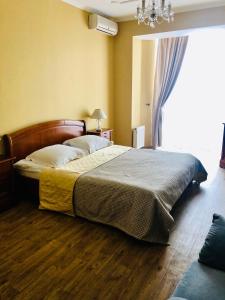 Postel nebo postele na pokoji v ubytování Hotel Palace Ukraine
