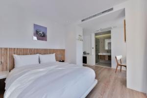 Postel nebo postele na pokoji v ubytování Hotel Mapp