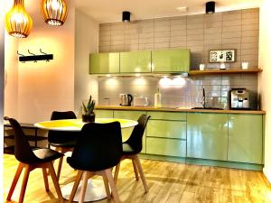 Køkken eller tekøkken på Apartament „Green Wall”