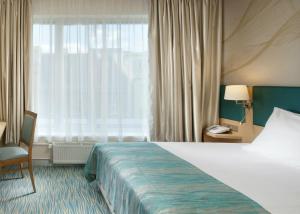 Posteľ alebo postele v izbe v ubytovaní Holiday Inn Prague by IHG