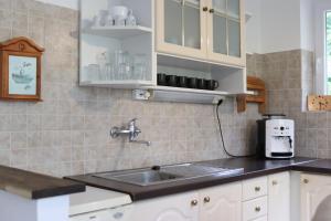 Kuchyň nebo kuchyňský kout v ubytování Grape&Wine Guesthouse