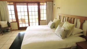 Tempat tidur dalam kamar di Old Inchgarth Farmstay