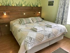 Voodi või voodid majutusasutuse Taos B&B toas