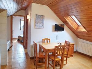 TV a/nebo společenská místnost v ubytování Apartament Casa Xulla 2