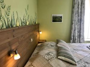 Voodi või voodid majutusasutuse Taos B&B toas