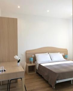 Кровать или кровати в номере Civico21