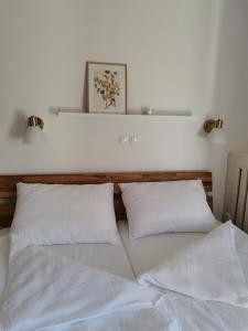 מיטה או מיטות בחדר ב-Apartma Lesjak - pobeg v naravo