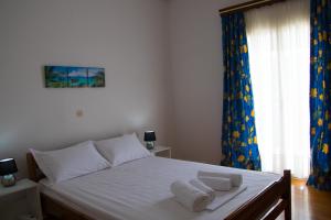 Zdjęcie z galerii obiektu Nikolaos Residence w mieście Kiato