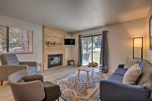 a living room with a couch and chairs and a fireplace at Park City Condo at Canyons Village with Amenities! in Park City