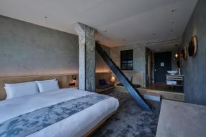 Rúm í herbergi á The Tower Hotel Nagoya