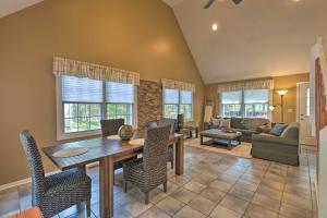 a living room with a wooden table and chairs at Year-Round Getaway Less Than 1 Mi to Skiing and Waterpark! in McGaheysville
