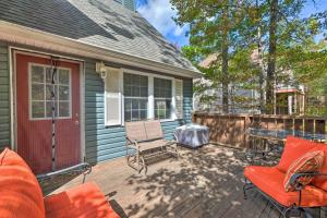 a patio with chairs and a table on a deck at Year-Round Getaway Less Than 1 Mi to Skiing and Waterpark! in McGaheysville