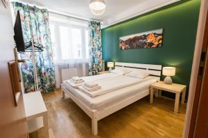 Cama ou camas em um quarto em Vintage Tomasza 25 Apartments