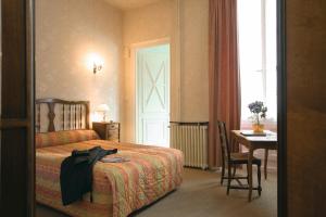 Postel nebo postele na pokoji v ubytování Hotel Du Nord