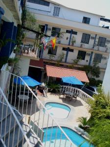Pemandangan kolam renang di Arcos hotel atau berdekatan