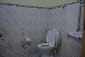 A bathroom at Rose Palace Hotel, Liberty