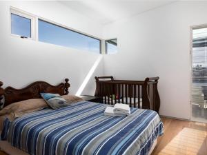 Tasman Drive Gerringong tesisinde bir odada yatak veya yataklar