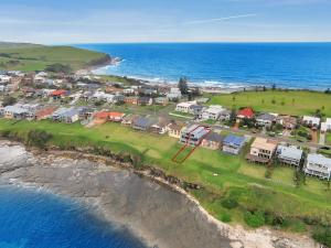 - une vue aérienne sur une maison sur la plage dans l'établissement Villa Nova Gerroa, à Gerroa