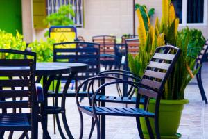 Restoran või mõni muu söögikoht majutusasutuses Sandton Hotel Kasese