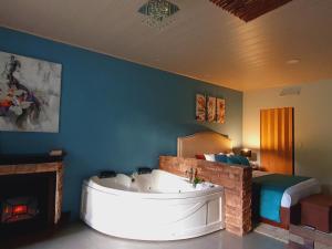 Voodi või voodid majutusasutuse Yellow Tree Suites toas