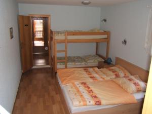 Postel nebo postele na pokoji v ubytování Ferienwohnung Veit + 15 fotografií