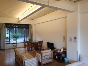 Un lugar para sentarse en Sanyi Happiness B&B
