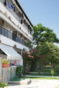 A garden outside Ermioni Apartments